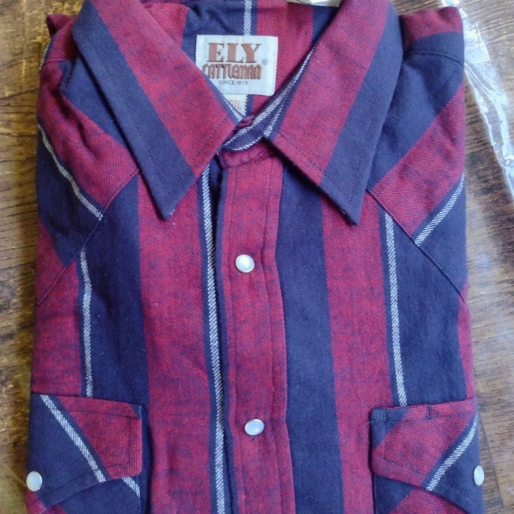 New Ely Cattlemen pearl snap large in original packaging. Was only taken out of